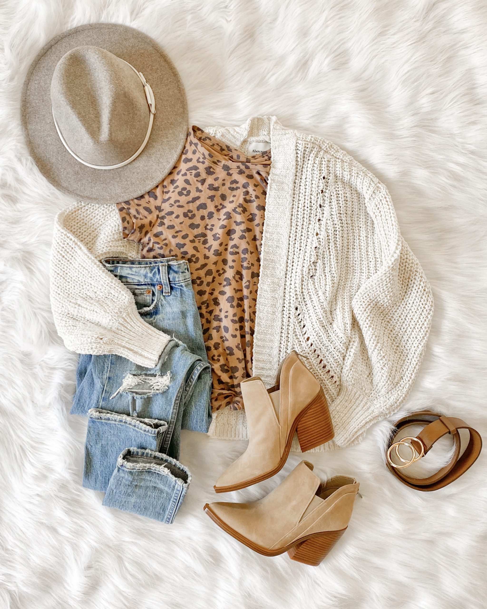 fall outfit, fall transition outfit, leopard print tshirt, distressed jeans, vince camuto booties, amazon belt, amazon hat