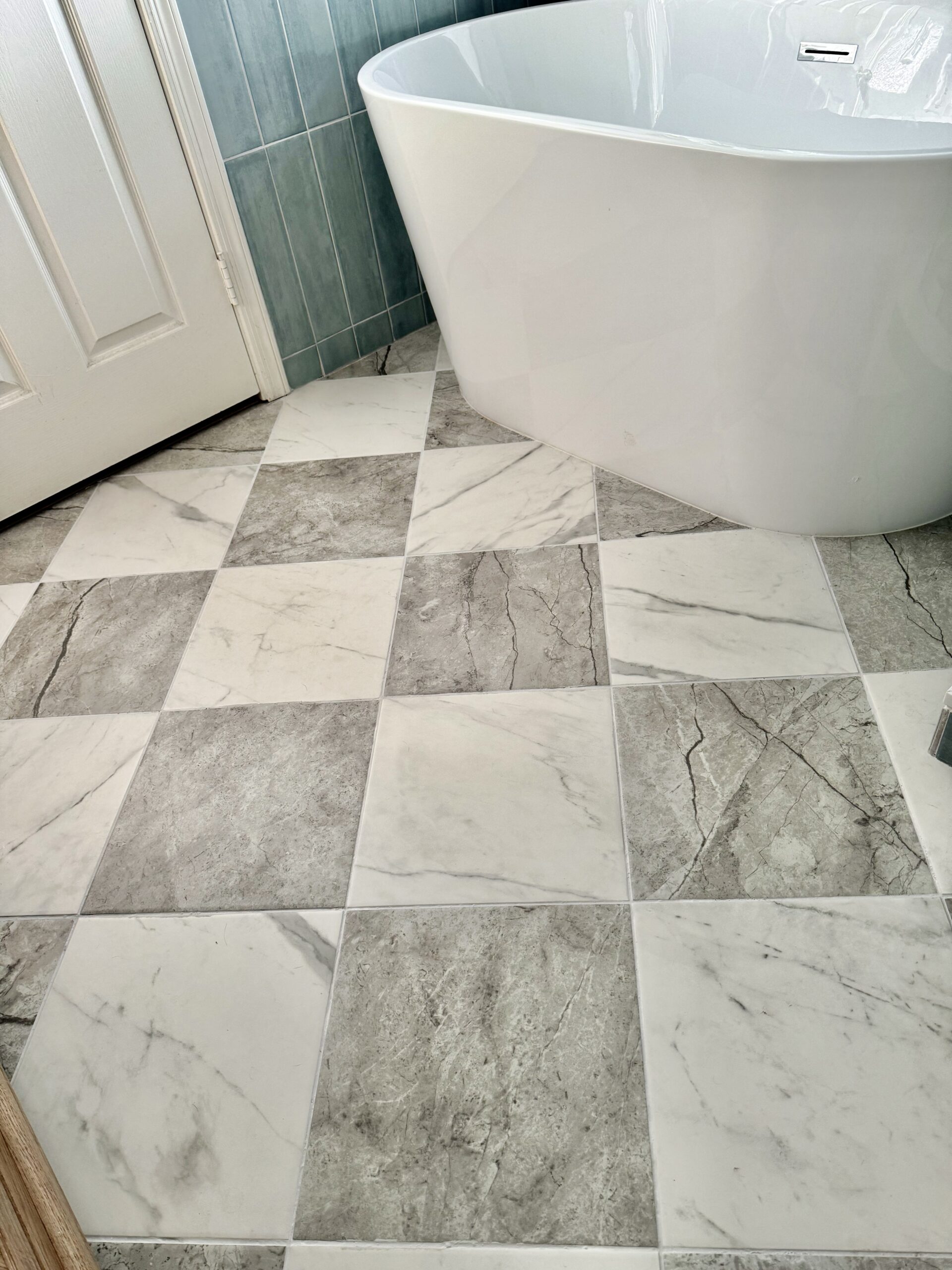 checkerboard tile floor. affordable checkerboard tile. porcelain checkerboard tile. checkerboard bathroom floor. bathroom renovation ideas. checkered floor. 