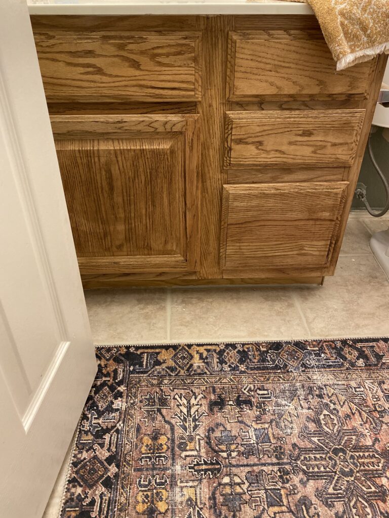 Small Bathroom Makeover. 90s builder grade cabinets. 90s oak cabinets makeover. budget friendly bathroom makeover.