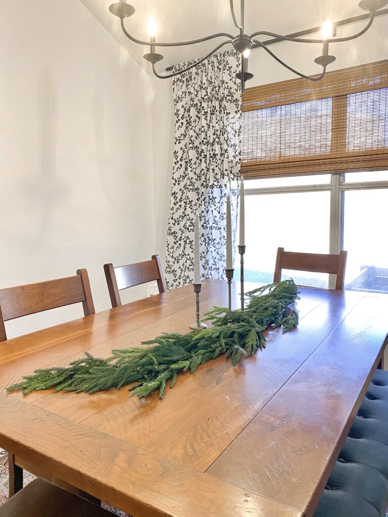 norfolk pine garland. afloral norfolk pine garland. christmas garland on dinging table. faux christmas garland review.