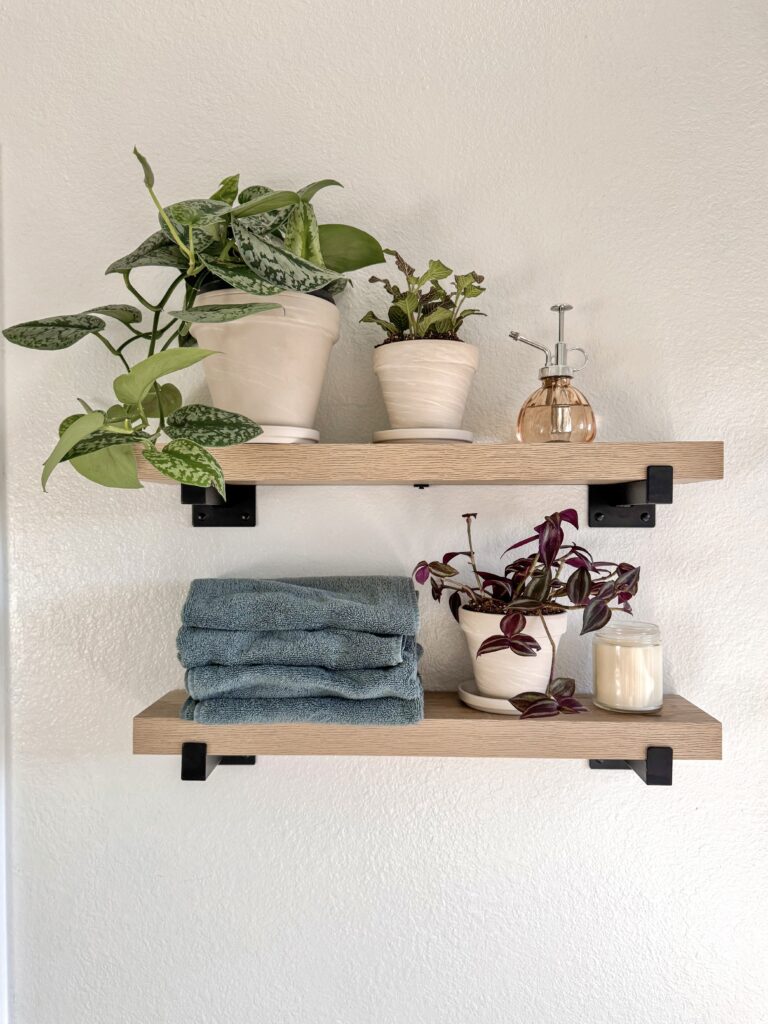 plant wall shelf ideas. bathroom shelf. above bathtub shelf. above toilet shelf ideas. indoor plant shelf. wooden wall shelf. floating shelves.